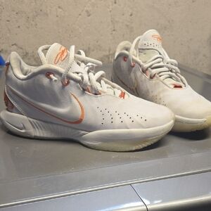Nike White Sneakers with Orange Detailing
